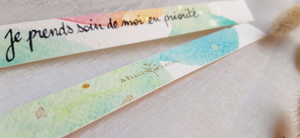 Détails de l'aquarelle et de l'écriture